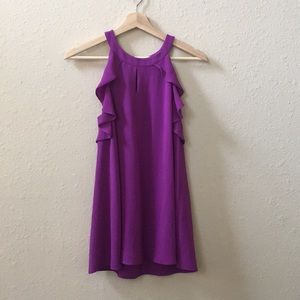 Sleeveless, ruffled blouse